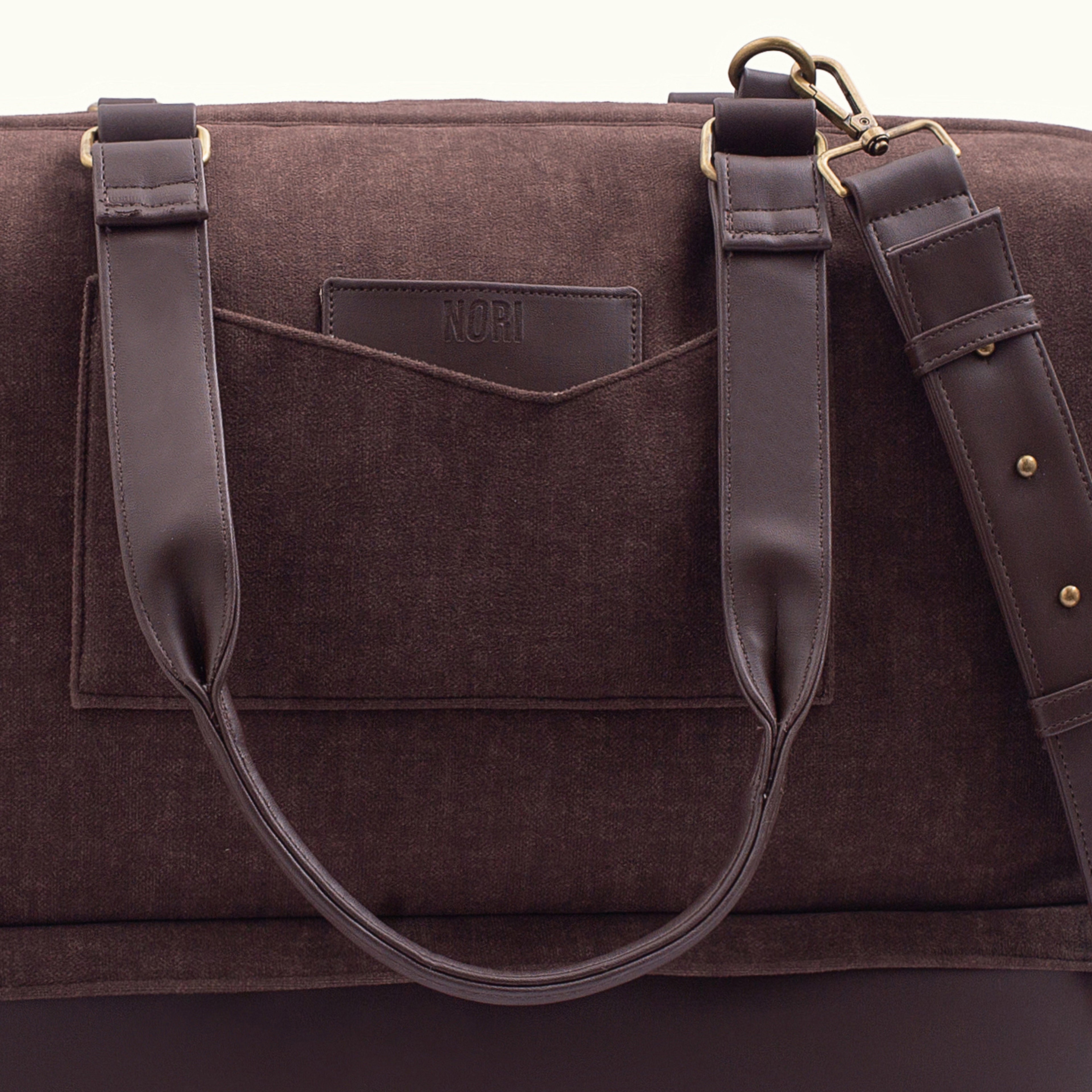 Polished metal accents + Quick access pockets