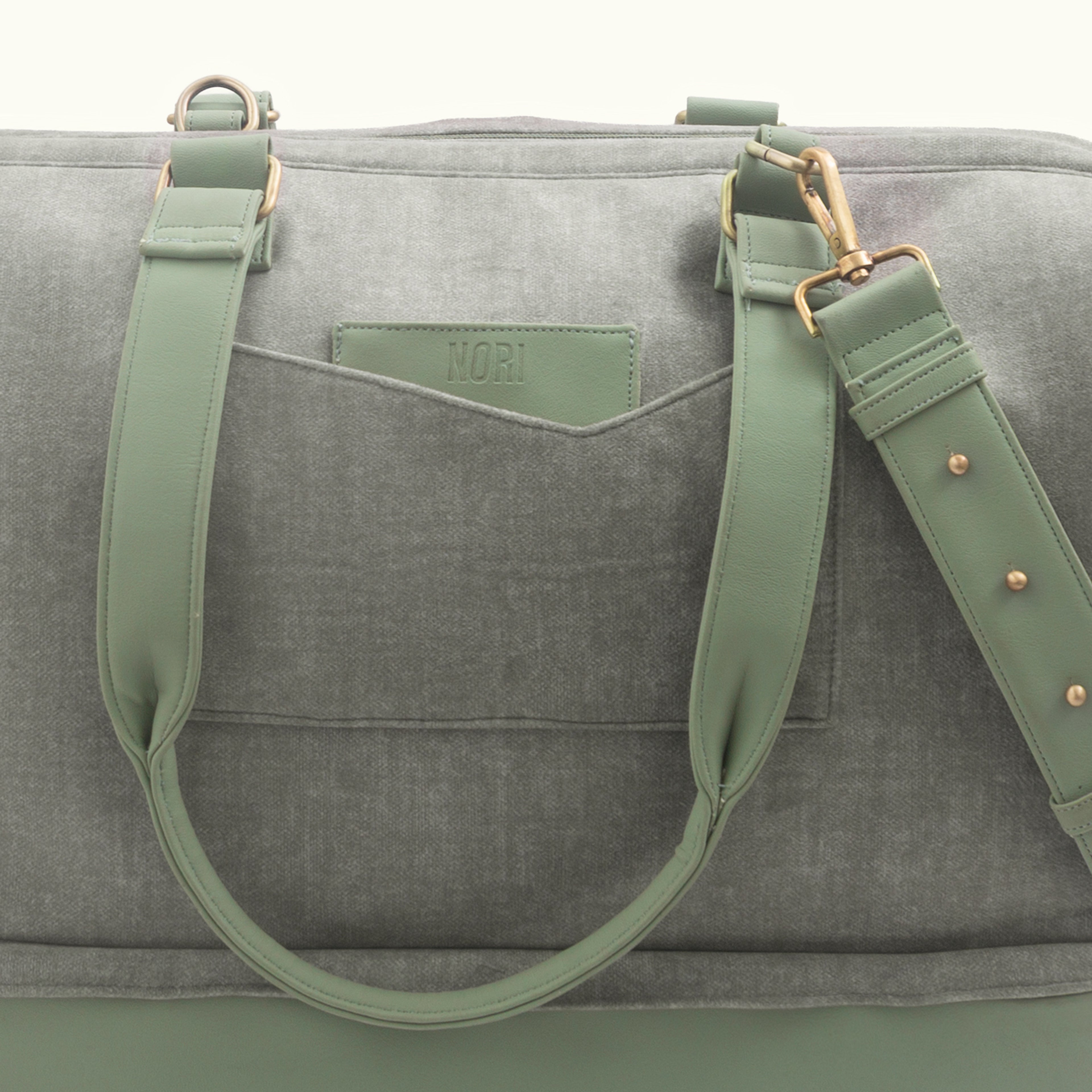 Polished metal accents + Quick access pockets