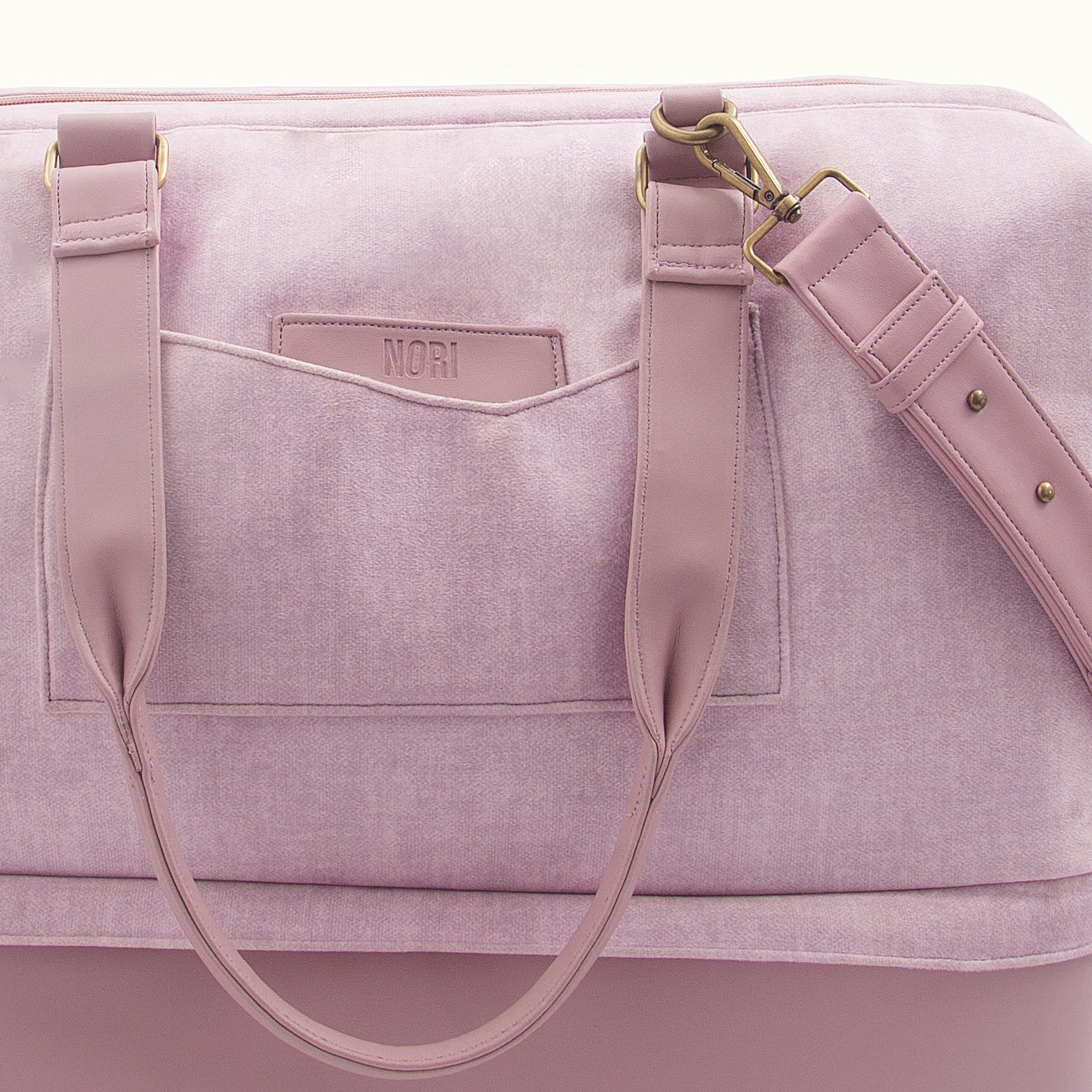 Polished metal accents + Quick access pockets